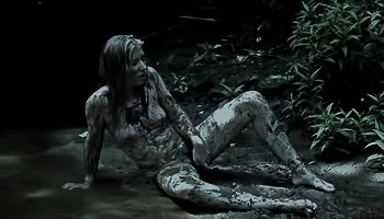 Brunette is having solo in the mud